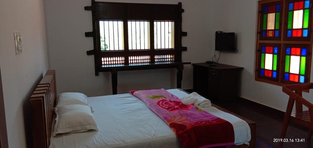 Room having breathtaking view of Brahmagiri  mountain ranges and courtyard